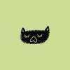 Cat face illustration rubber stamp on green background.