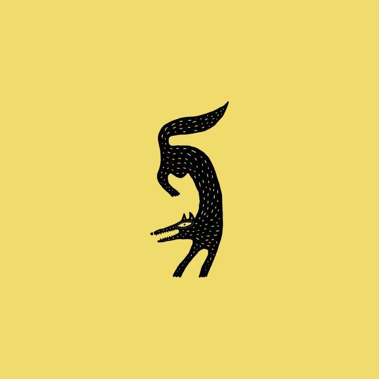 Rubber stamp with a minimalist fox silhouette on a yellow background.