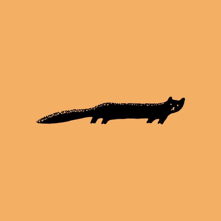 Rubber stamp with a lizard illustration on an orange background.