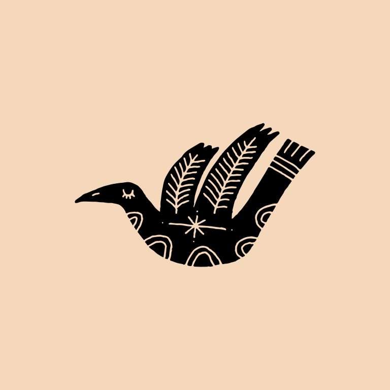 Rubber stamp with a bird in flight illustration on a peach background.
