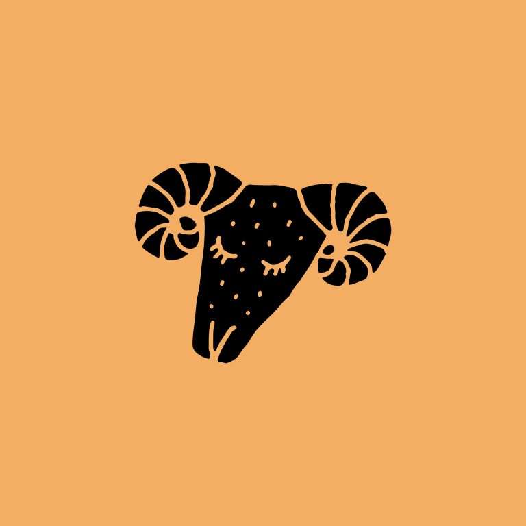Rubber stamp with a ram illustration on an orange background.