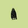 Rubber stamp with an owl illustration on a green background.