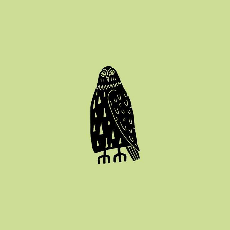 Rubber stamp with an owl illustration on a green background.