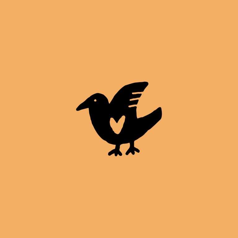 Rubber stamp with a bird illustration on an orange background.