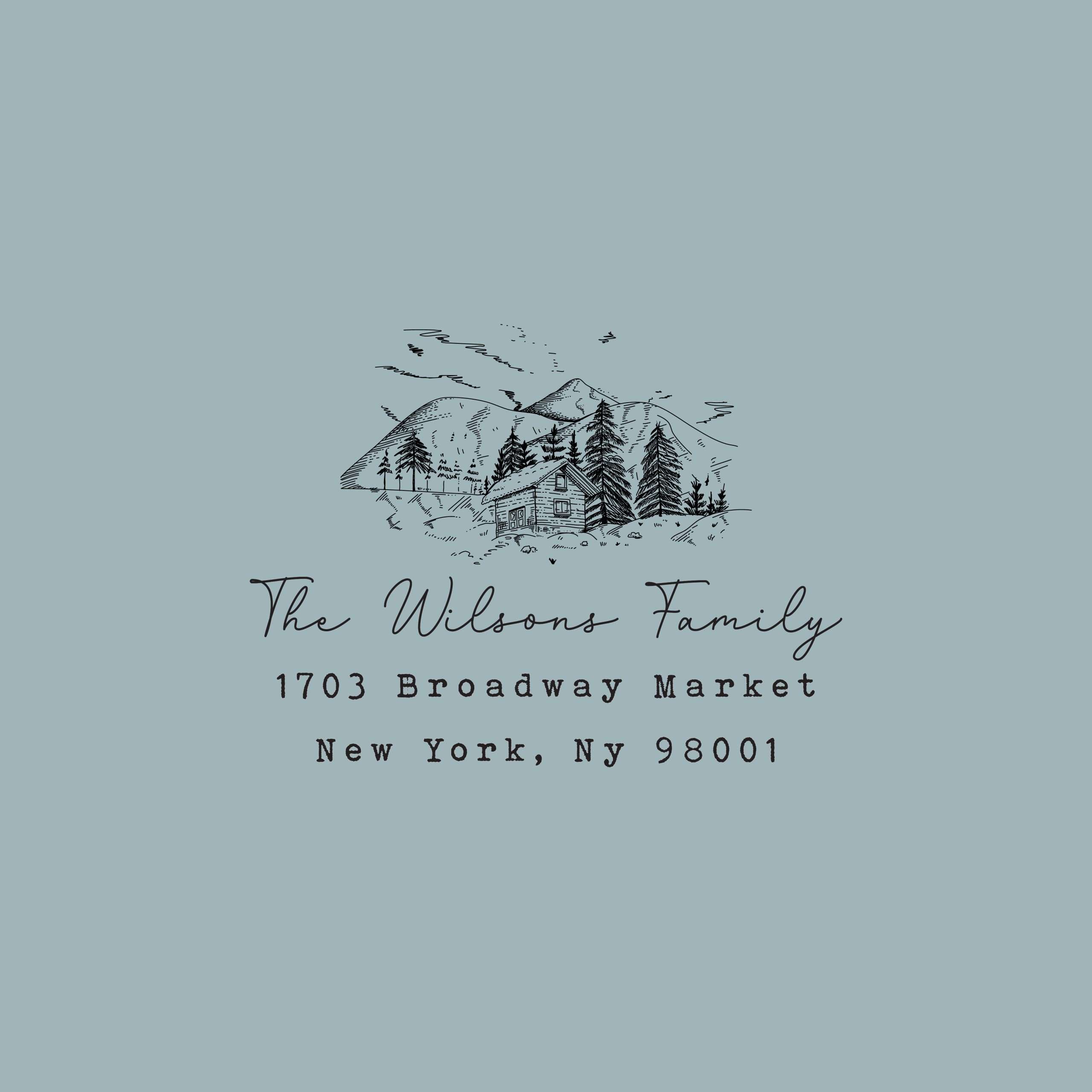 Return address stamp with illustrated mountains and custom family name.