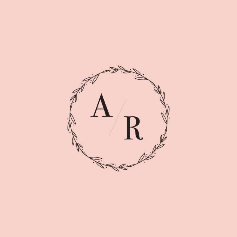 Pink wedding embosser with circular border and initials.