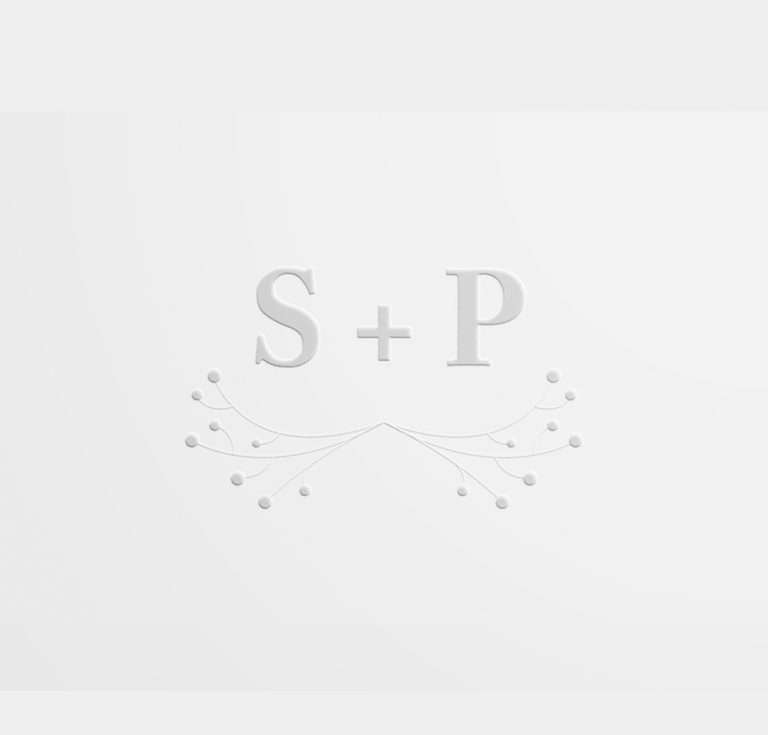White minimalist embosser impression with initials.