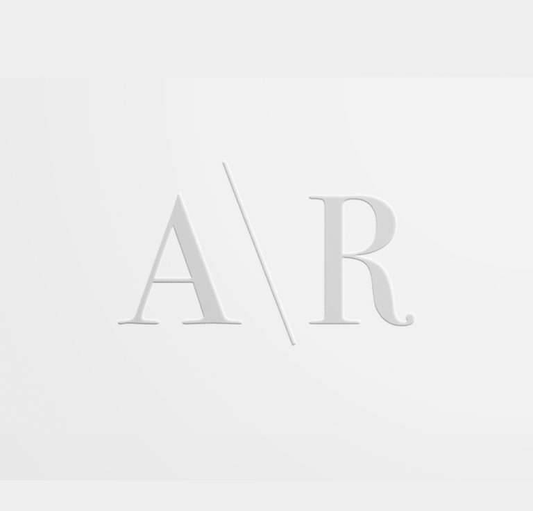Wedding embosser design featuring initials in clean, raised style.