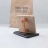 Brown kraft paper bag ink pad and rubber stamp stamped with custom logo.