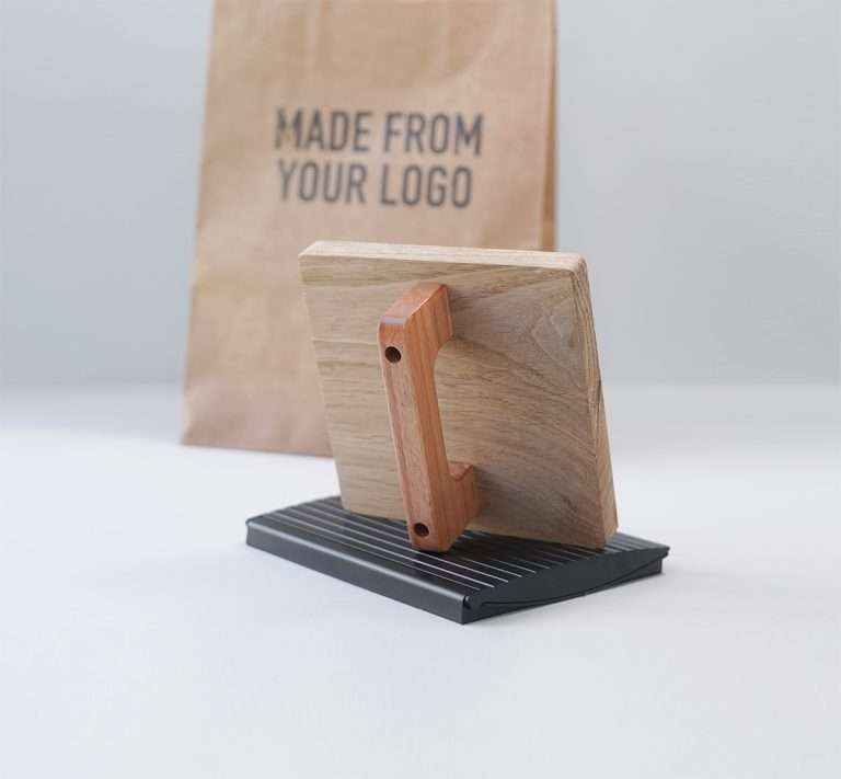 Brown kraft paper bag ink pad and rubber stamp stamped with custom logo.