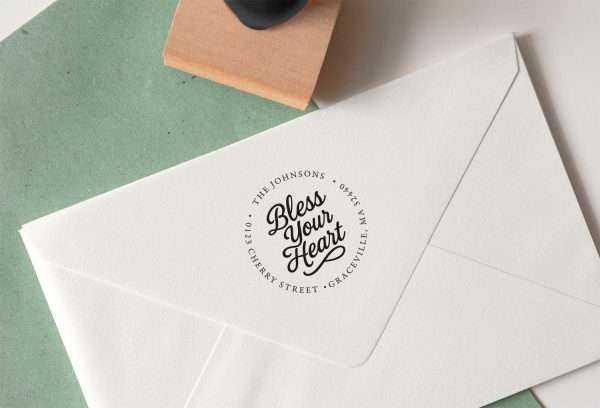 Round custom address rubber stamp with elegant script by Expressionery.
