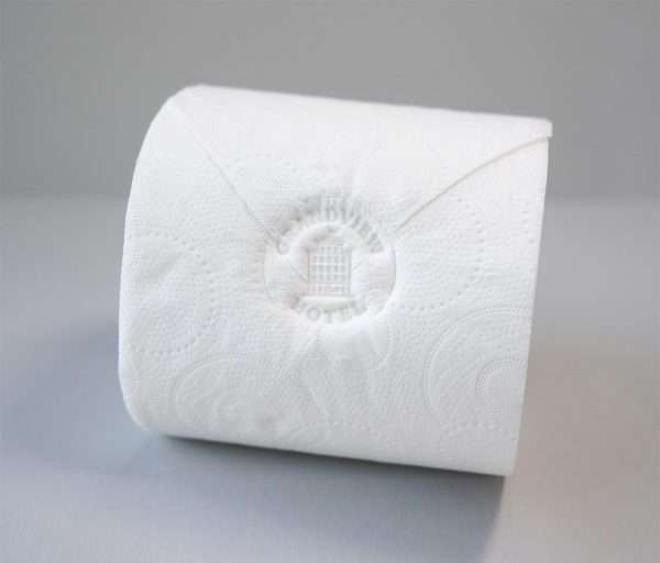 Pixie rubber stamp design embossed on toilet roll paper.