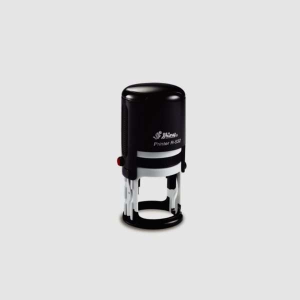 Black Shiny self-inking stamp model 532, 30 mm round design.