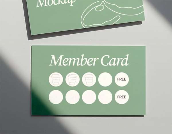 Green embossed loyalty card mockup with stamp impressions.